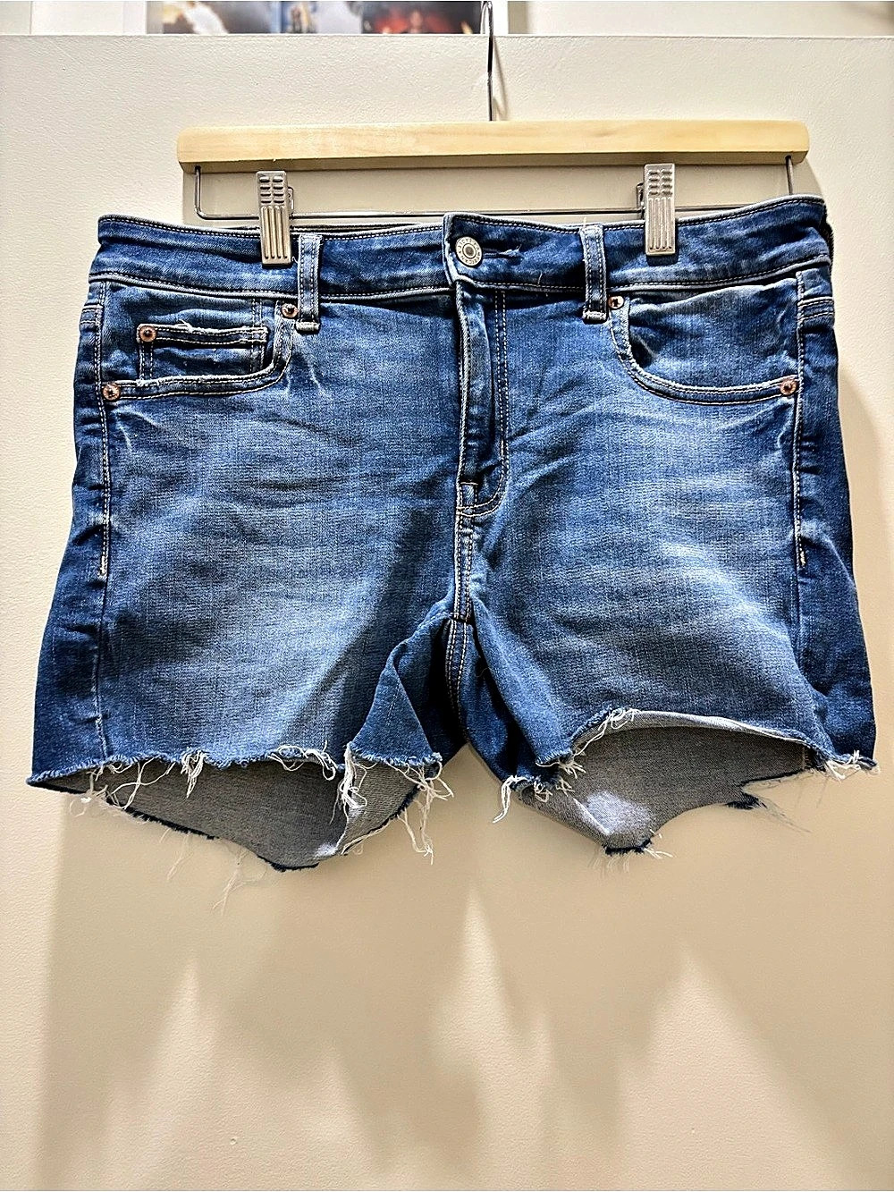 American Eagle Distressed Raw Hem Jean Shorts in Blue